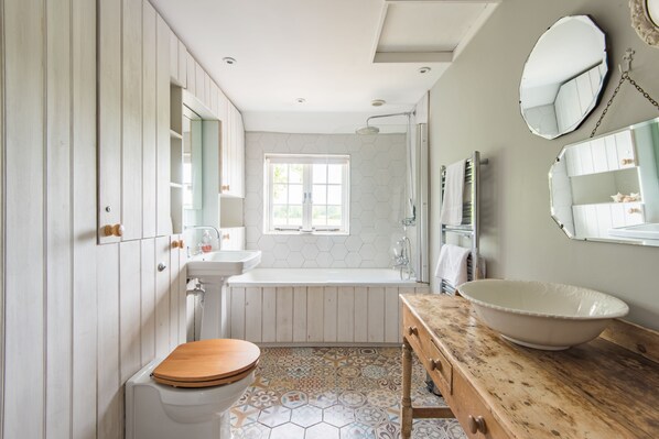Combined shower/tub, hair dryer