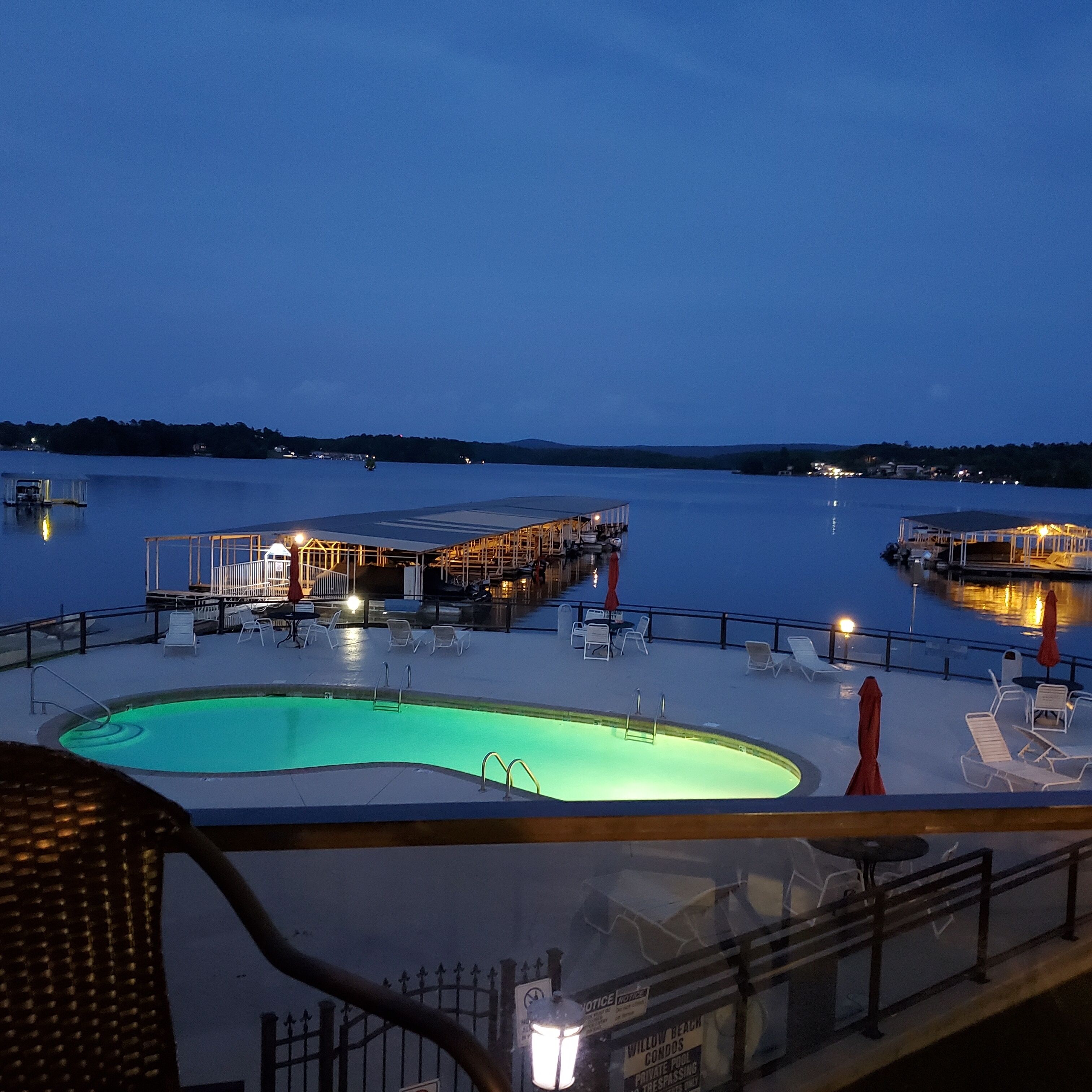 Overlooks both the pool and the lake and has a covered boat slip