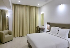 Desk, laptop workspace, free WiFi, bed sheets