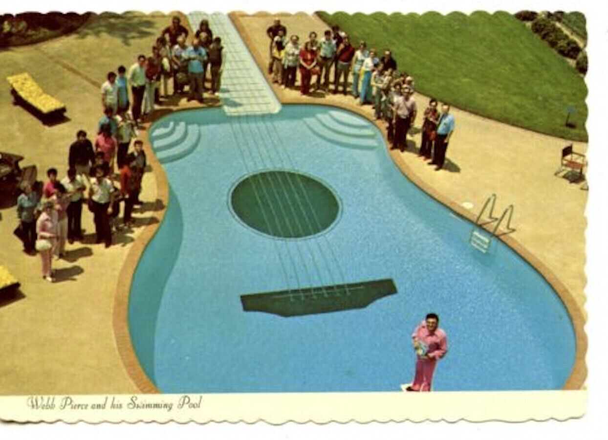 A pool shaped like a guitar with a person standing in the center.