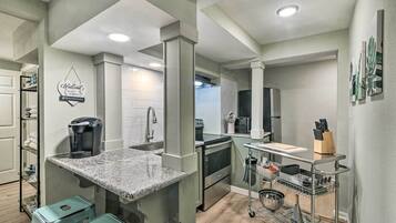 Fridge, microwave, stovetop, coffee/tea maker