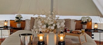 Bell tent in ultimate luxury with a wood fired hot tub, super king size bed