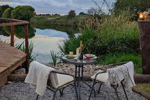 Outdoor dining - Bell tent in ultimate luxury with a wood fired hot tub, super king size bed (Shebdon)