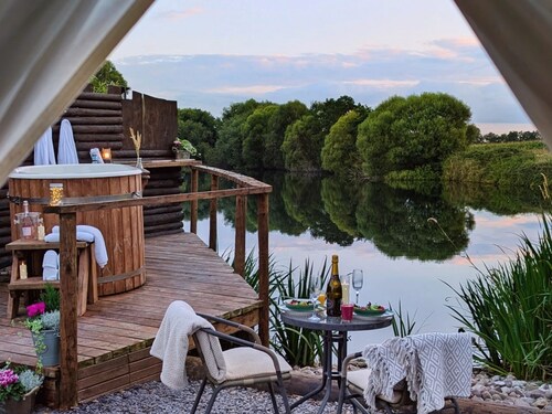 Bell tent in ultimate luxury with a wood fired hot tub, super king size bed