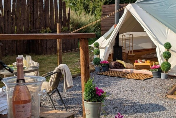 Property grounds - Bell tent in ultimate luxury with a wood fired hot tub, super king size bed (Shebdon)