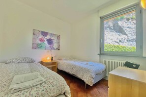 Family Apartment, Multiple Bedrooms, 2 Bathrooms, Mountainside (Gaeta 'Lake View') | 2 bedrooms, iron/ironing board, free WiFi, bed sheets