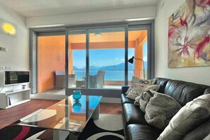 21-inch flat-screen TV with satellite channels, TV