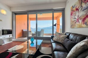 Family Apartment, 2 Bedrooms, 2 Bathrooms, Mountainside (Gaeta 'Lake View') | Living area | TV - Gaeta 'lake View' (San Siro)