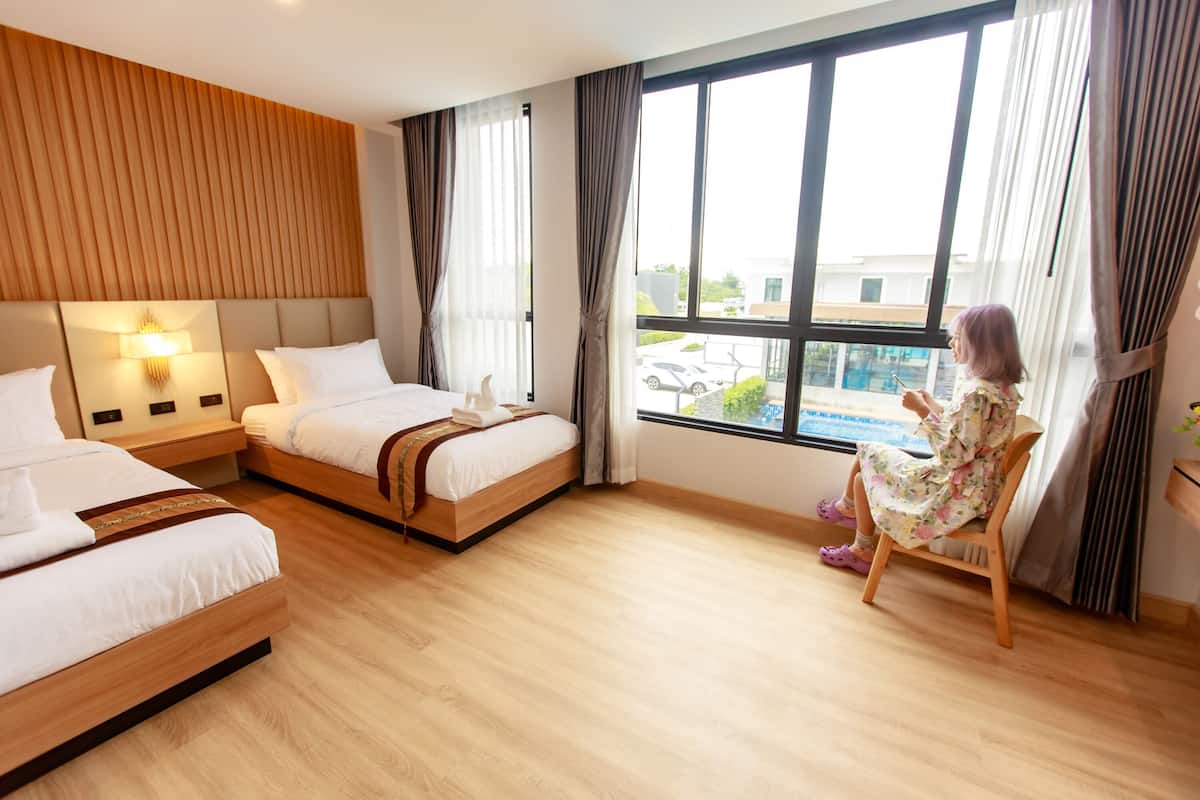 Habitación Deluxe con 2 camas individuales | Minibar, wifi gratis y ropa de cama