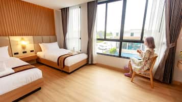 Deluxe-Zweibettzimmer | Minibar, kostenloses WLAN, Bettwäsche