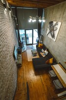 Premium Bungalow | Living area | 50-inch LCD TV with satellite channels, TV, Netflix