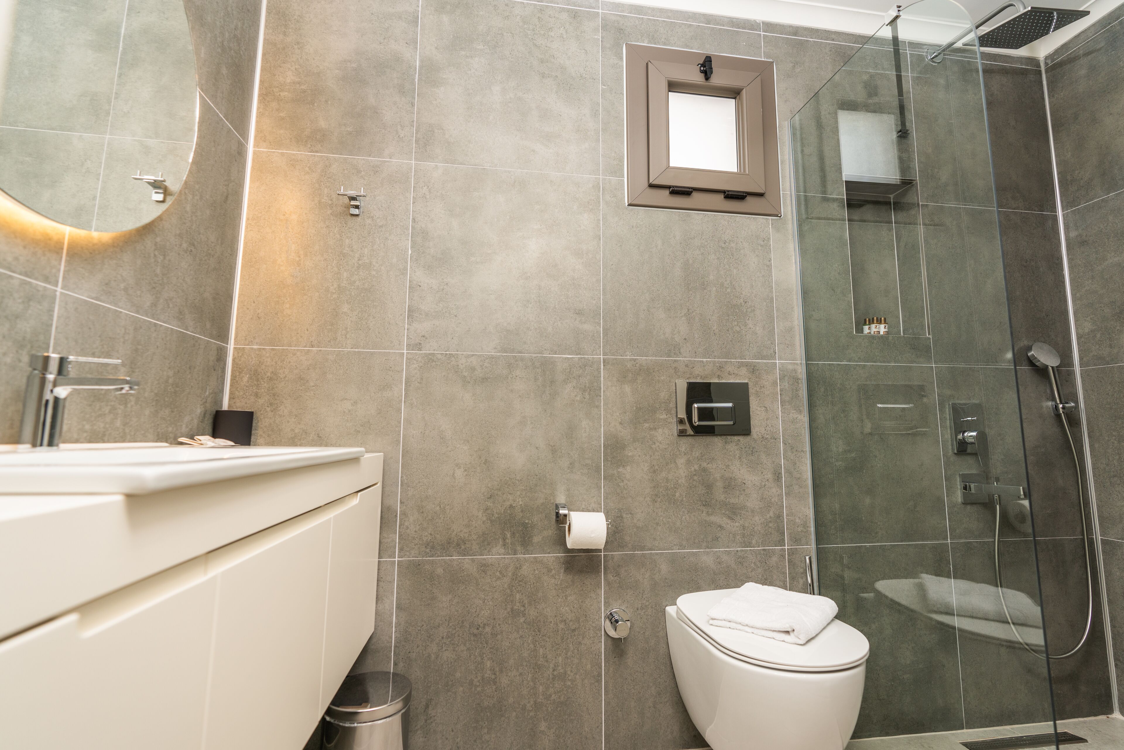 shower, rainfall showerhead, hair dryer, slippers