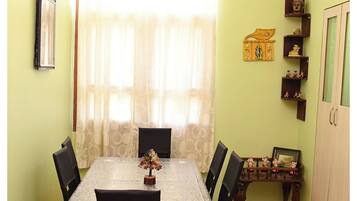 Apartamento luxo, 2 quartos, vista para a cidade | Sala de jantar