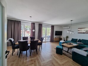 House (Four Bedroom Holiday Home) | Living room | TV, fireplace