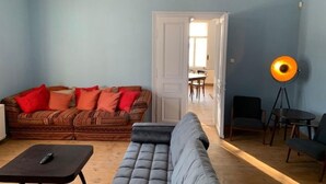 A living room with a sofa, a loveseat, and a floor lamp. - Spacious holiday home in Šluknov with private garden (Šluknov)