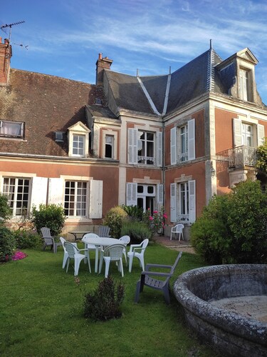 Village property in the Perche region with basic shops and SNCF train station.