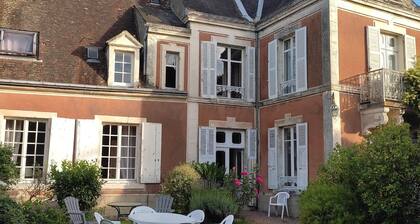 Village property in the Perche region with basic shops and SNCF train station.