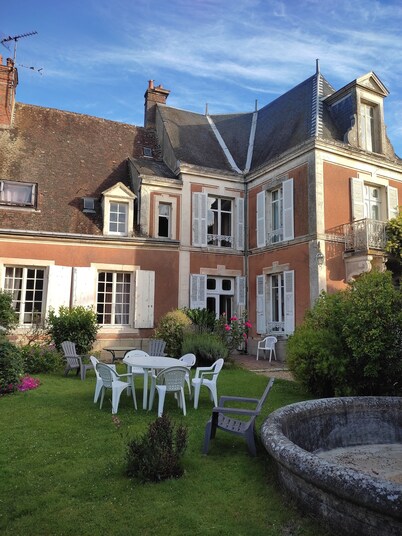 Village property in the Perche region with basic shops and SNCF train station.