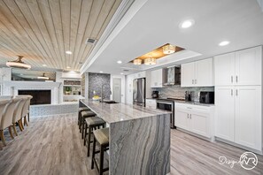 House | Private kitchen | Fridge, highchair, cookware/dishes/utensils, dining tables - Chic 8BR with Heated Pool & Waterview (Largo)