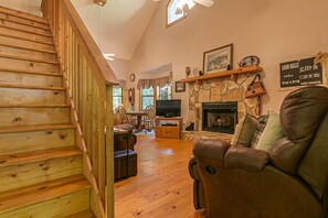 Smart TV, fireplace, books, offices