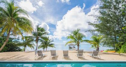 White Cottage: Deluxe Oceanfront Home w/Backyard Beachfront, Private Pool, Dock