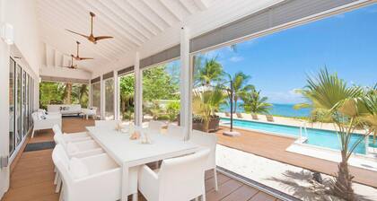 White Cottage: Deluxe Oceanfront Home w/Backyard Beachfront, Private Pool, Dock