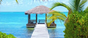 White Cottage: Luxe Beach Cottage w/Private Pool, Backyard Beach and Dock