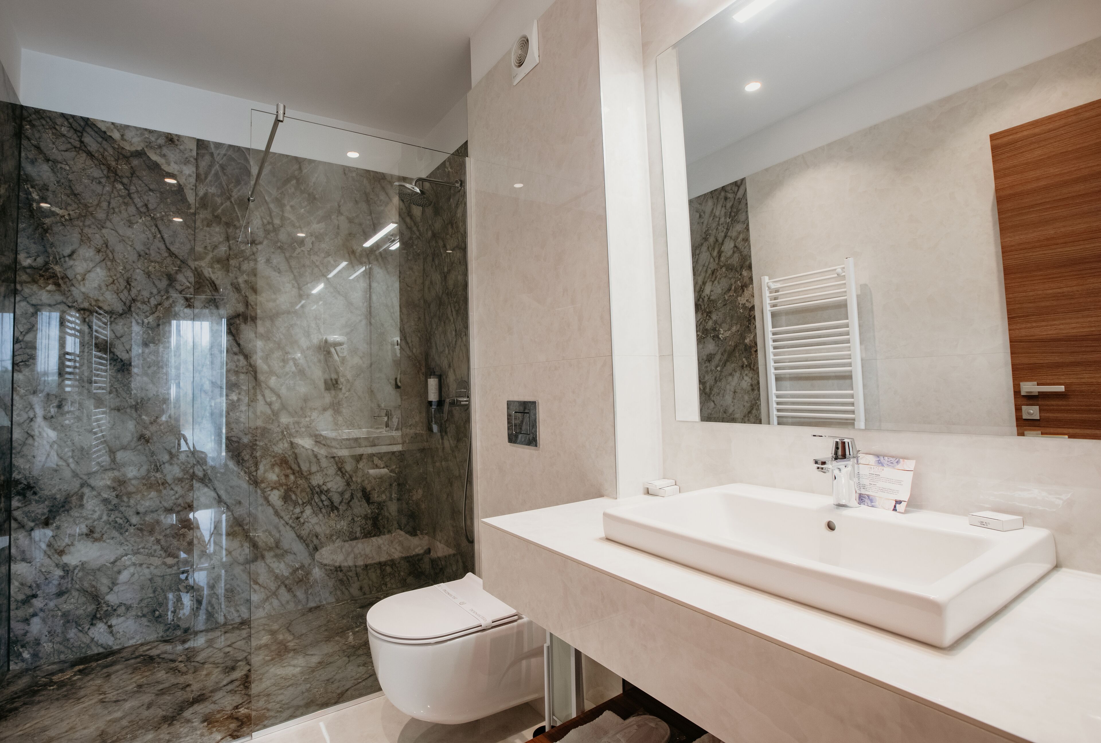 shower, free toiletries, hair dryer, slippers