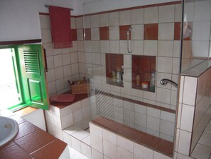 Shower, hair dryer, towels, toilet paper