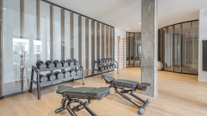A gym with exercise equipment, including dumbbells and a bench. - Colinas - Bentor 3.1 PENTHOUSE 3B JACUZZI POOL VIEW (Arona)