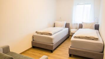 Appart'hôtel Luxe | 2 chambres, literie hypoallergénique, fer et planche à repasser