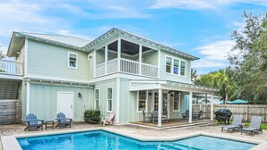 A two-story house with a pool, outdoor seating, and a covered patio. - Private Pool, Pet Friendly, and Beach Access- Sea-Rest by Royal Destinations (Inlet Beach)