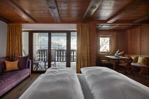 Luxe beddengoed, een minibar, een kluis op de kamer, een bureau