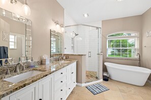 Bathtub, hair dryer, towels, soap