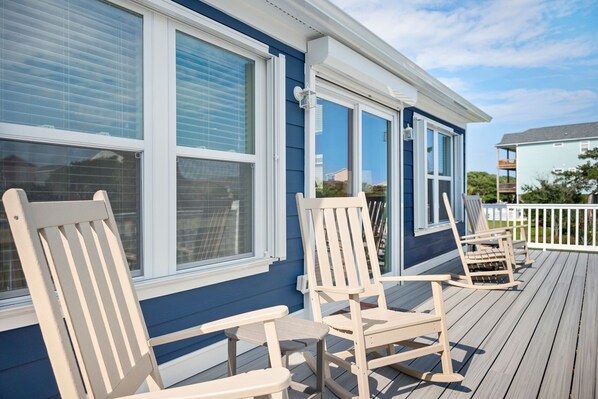 Relax on the deck with Adirondack chairs and enjoy the serene surroundings.