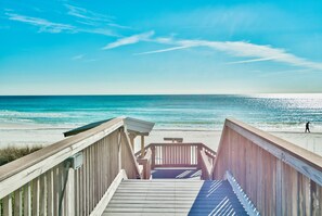 A wooden boardwalk leading to a beach with a clear view of the ocean. - Huntington By The Sea 206. Gulf Front, Community Pool, Free Beach Service. (Miramar Beach)