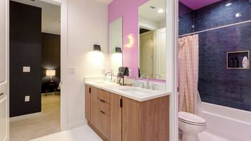 Bathtub, hair dryer, towels