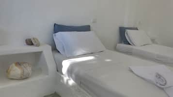 Tabla de planchar con plancha, wifi gratis y ropa de cama