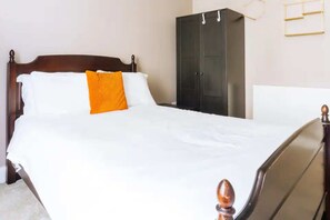Appartement, plusieurs lits | 3 chambres, fer et planche Ă repasser, draps fournis