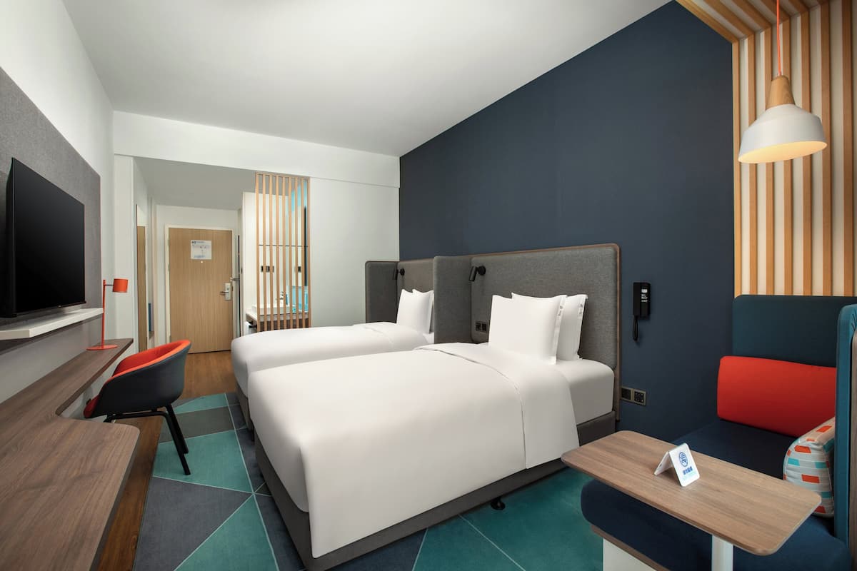 Premium bedding, down comforters, in-room safe, desk