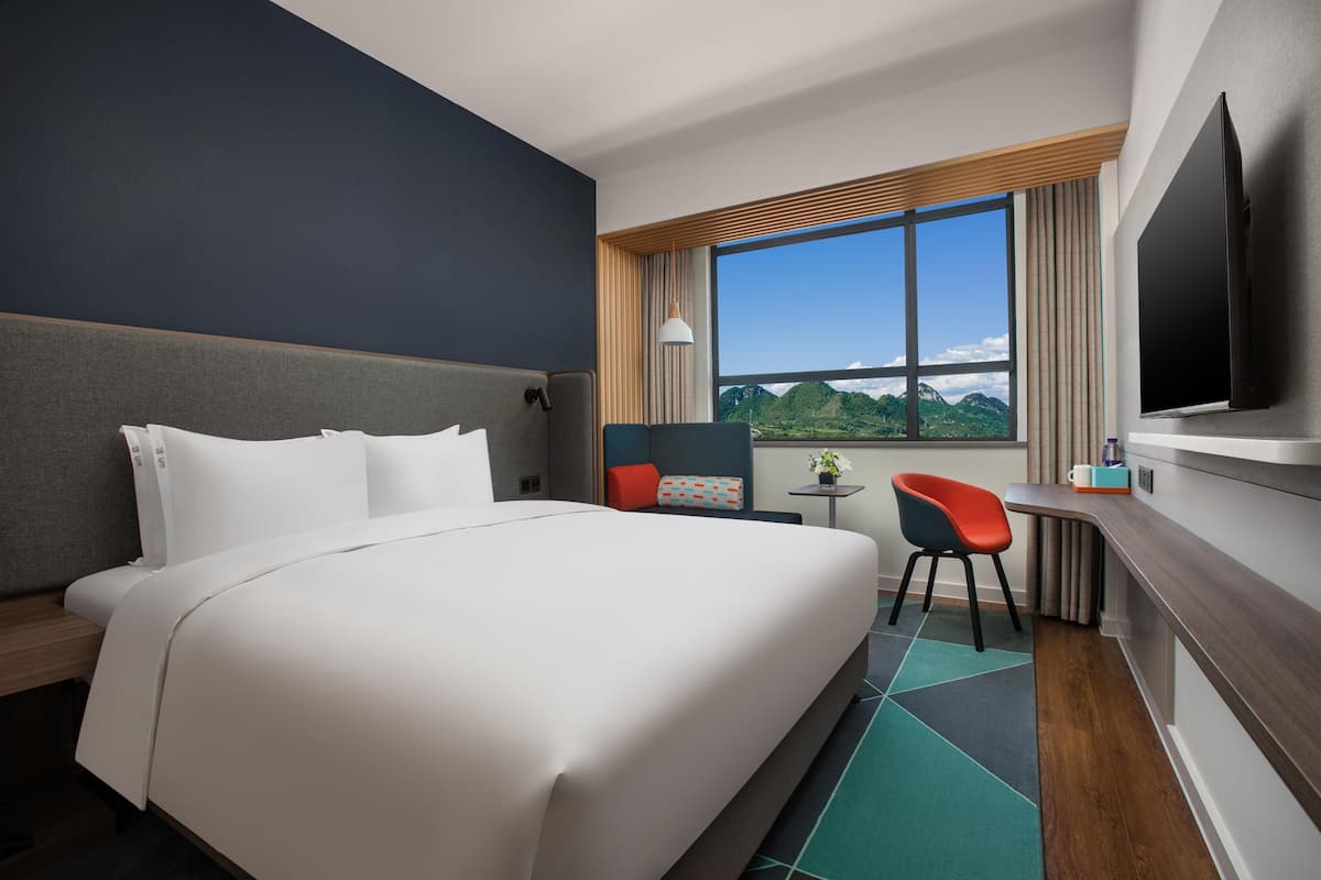 Premium bedding, down comforters, in-room safe, desk
