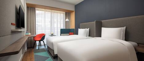 Premium bedding, down comforters, in-room safe, desk