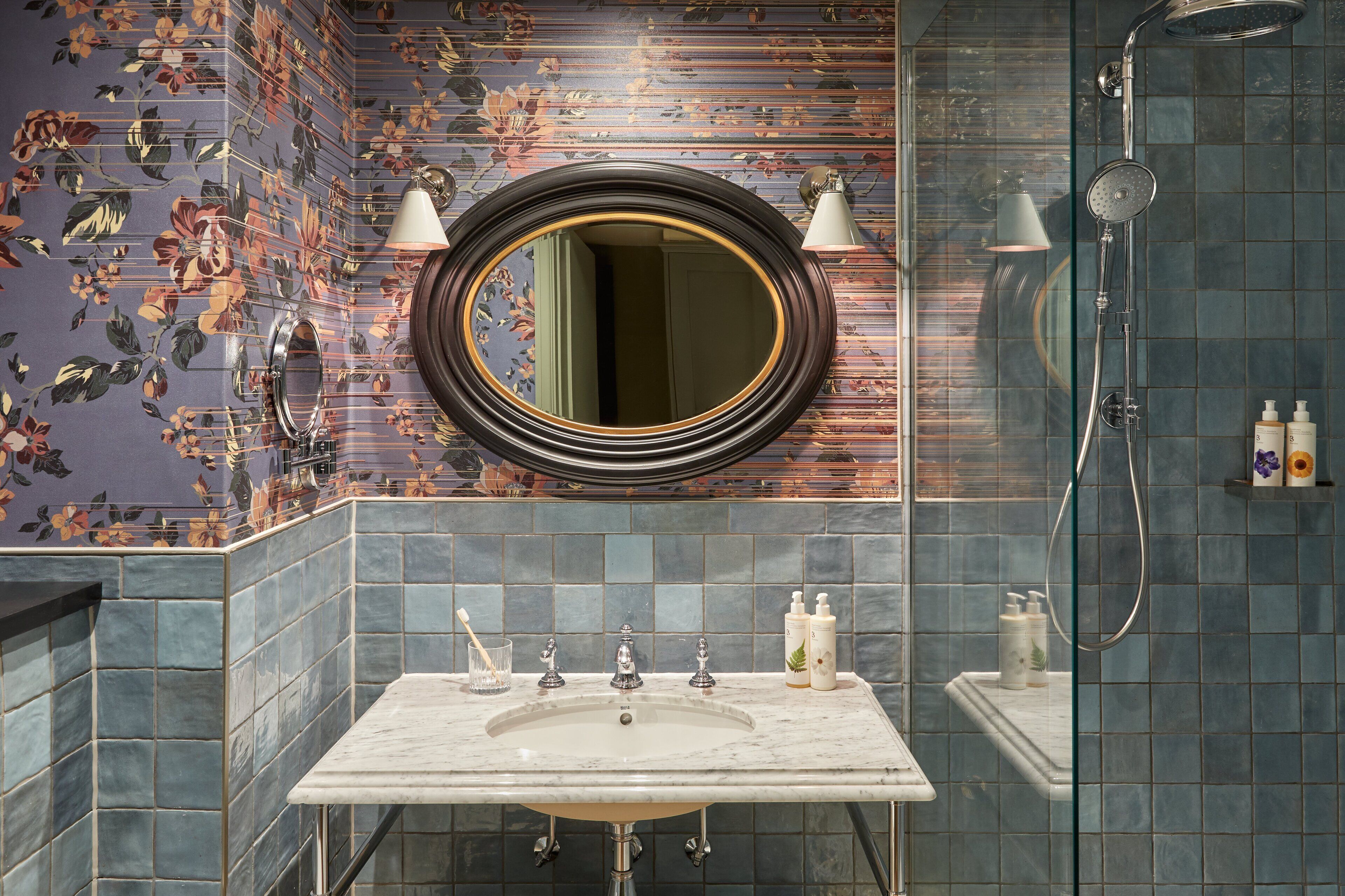 designer toiletries, hair dryer, bathrobes, towels