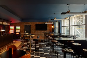 2 bars/lounges, sports bar, rooftop bar