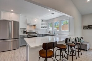 Fridge, microwave, oven, stovetop - Beach House (Lake Mills)