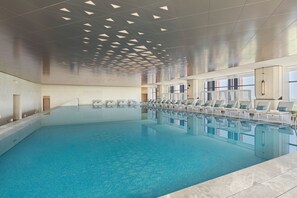 Indoor pool, open 6:00 AM to 10:30 PM, sun loungers, lifeguards on site