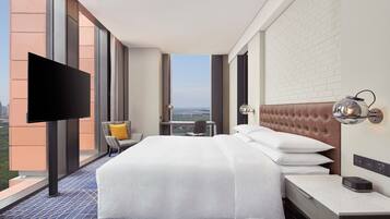 Premium bedding, down comforters, minibar, in-room safe