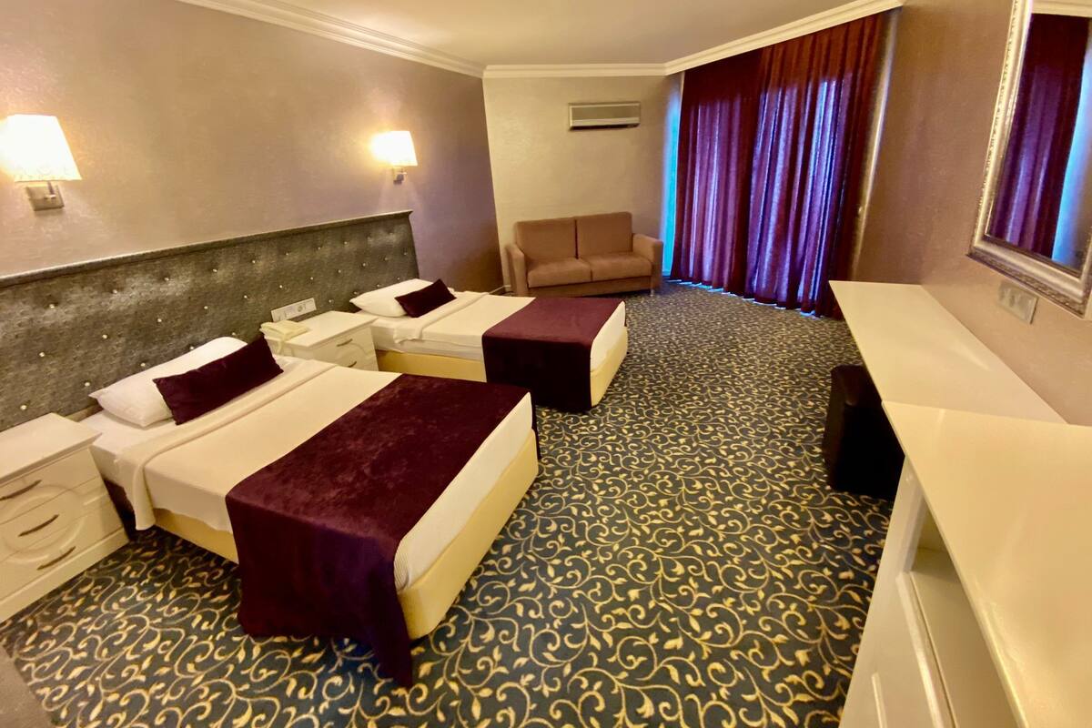 Minibar (some free items), desk, bed sheets