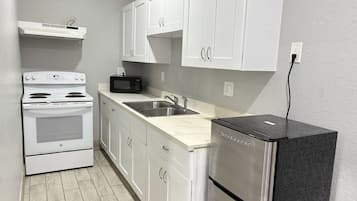 Mini-fridge, microwave, dining tables