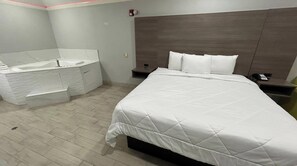 Room, 1 King Bed, Non Smoking, Jetted Tub | Iron/ironing board, free WiFi, bed sheets - Kiwi Inn Capital O Houston - Hwy 249 (Houston)